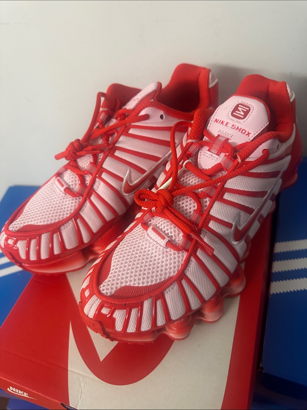 Nike Shox TL IQ5090-663
Pink Foam Habanero Red Grade School Size